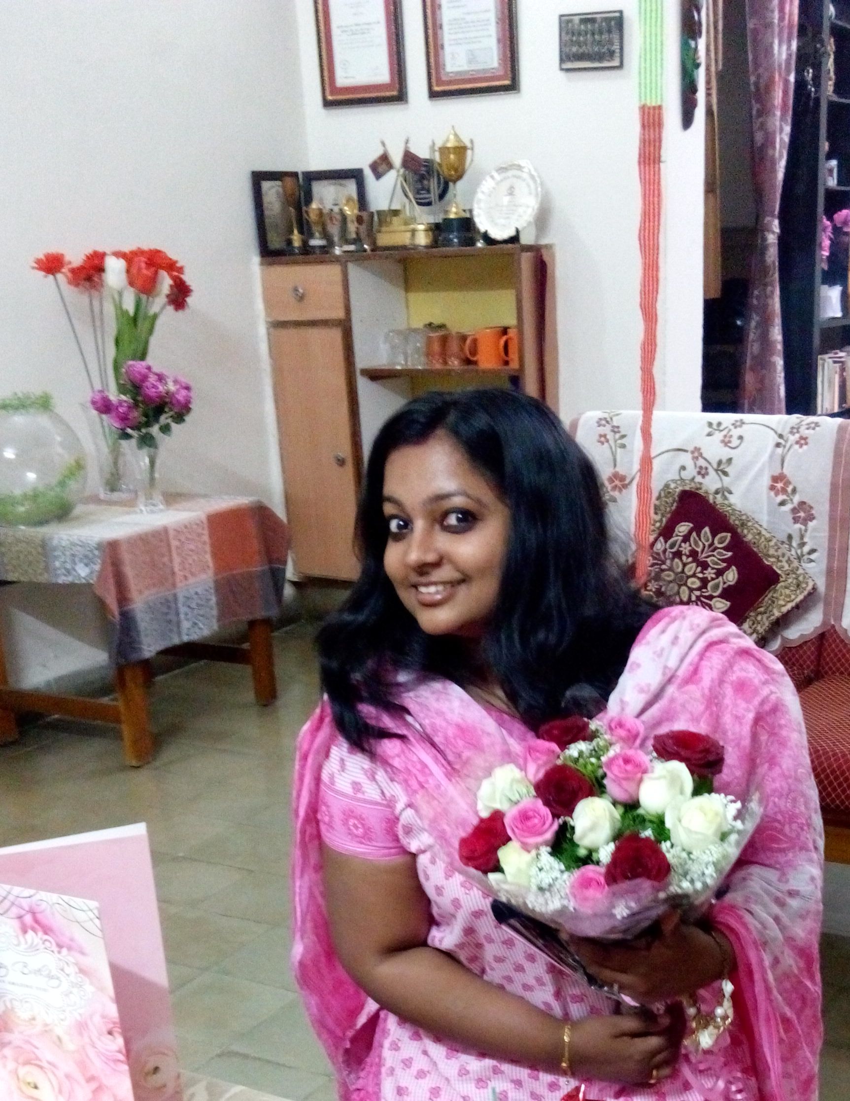 No.no.no...don't look at me! Look at the trophy stand behind!